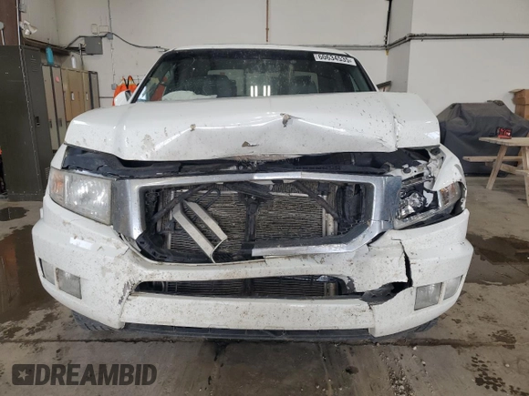 2012 Honda Ridgeline RTL with VIN 5FPYK1F59CB501178, listed as a Copart auction lot 60634535 with 165,766 mi miles and Salvage title. Bid and sale history available at DreamBid. Image 5.