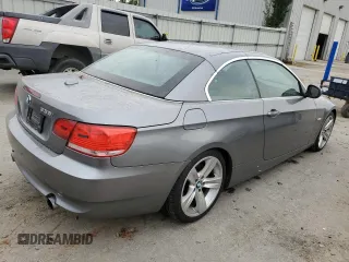 2010 BMW 3 Series 335i with VIN WBAWL7C50AP476272, listed as a Copart auction lot 74719554 with 77,117 mi miles and Salvage Title. Bid and sale history available at carsss.com. Image 3.