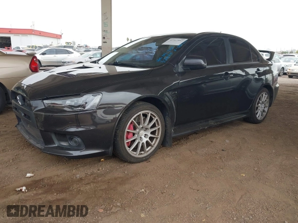 2013 Mitsubishi Lancer Evolution GSR with VIN JA32W8FV6DU009257, listed as a IAAI auction lot 41917942 with 125,279 mi miles. Bid and sale history available at carsss.com. Image 17.
