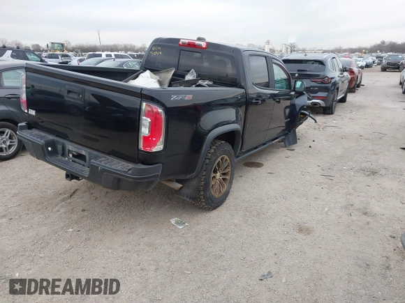 2018 Chevrolet Colorado 4WD ZR2 with VIN 1GCGTEENXJ1164617, listed as a IAAI auction lot 41354074 with 61,155 mi miles. Bid and sale history available at carsss.com. Image 4.