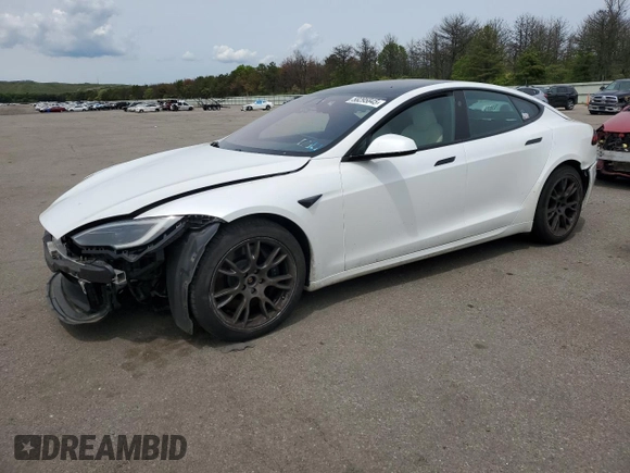 2022 Tesla Model S z VIN 5YJSA1E57NF487187, wystawiony jako Copart lot #58295845 z przebiegiem 50 879 mil mil oraz Szkoda całkowita • Salvage title. Historia ofert i sprzedaży dostępna na DreamBid. Obrazek 1.