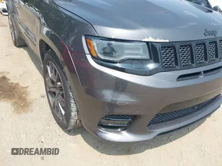 2018 Jeep Grand Cherokee SRT z VIN 1C4RJFDJ7JC281644, wystawiony jako IAAI lot #42481239 z przebiegiem 160 218 mil mil oraz . Historia ofert i sprzedaży dostępna na DreamBid. Obrazek 6.