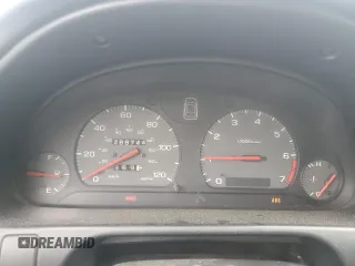 1998 Subaru Legacy L with VIN 4S3BK435XW6316402, listed as a Copart auction lot 60301805 with 288,744 mi miles and Salvage title. Bid and sale history available at DreamBid. Image 9.