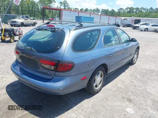 1999 Ford Taurus SE Standard with VIN 1FAFP58U6XA228265, listed as a IAAI auction lot 42623666 with 137,429 mi miles and . Bid and sale history available at DreamBid. Image 4.