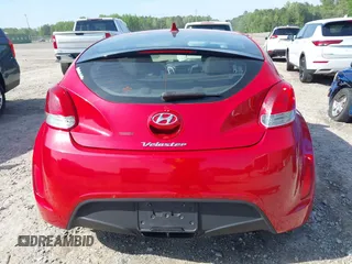 2013 Hyundai Veloster w/Gray Int with VIN KMHTC6AD8DU112810, listed as a IAAI auction lot 42144625 with 142,524 mi miles and . Bid and sale history available at DreamBid. Image 16.
