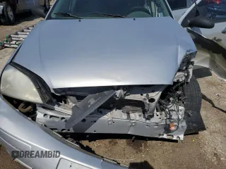 2005 Ford Focus S with VIN 1FAFP34N95W247489, listed as a Copart auction lot 60858415 with Not provided miles and Salvage title. Bid and sale history available at DreamBid. Image 11.