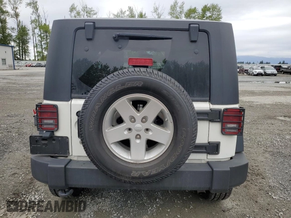 2010 Jeep Wrangler Sport with VIN 1J4AA2D12AL130050, listed as a Copart auction lot 54736025 with 48,262 mi miles and Salvage Title. Bid and sale history available at carsss.com. Image 6.