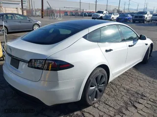 2022 Tesla Model S with VIN 5YJSA1E56NF493062, listed as a IAAI auction lot 41616427 with 41,874 mi miles. Bid and sale history available at carsss.com. Image 4.