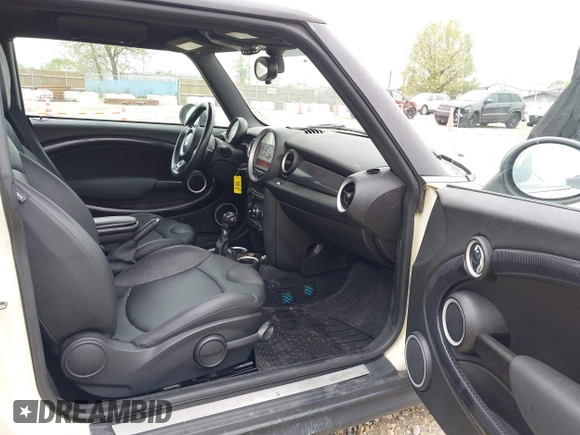 2013 MINI Hardtop S with VIN WMWSV3C54DT394199, listed as a IAAI auction lot 42163715 with 146,548 mi miles and . Bid and sale history available at DreamBid. Image 5.