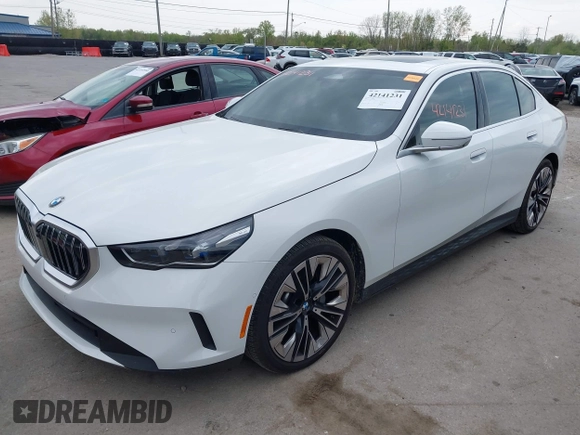 2024 BMW 5 Series 530i xDrive with VIN WBA53FJ03RCS25603, listed as a IAAI auction lot 42141231 with Not provided miles and . Bid and sale history available at DreamBid. Image 2.