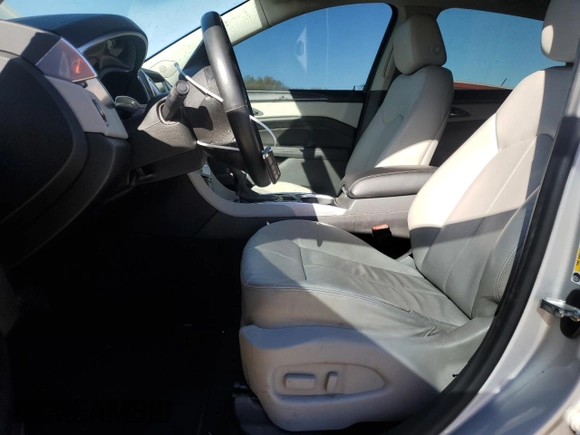 2014 Cadillac SRX with VIN 3GYFNAE36ES680324, listed as a Copart auction lot 50034625 with 150,014 mi miles and Salvage Title. Bid and sale history available at DreamBid. Image 7.