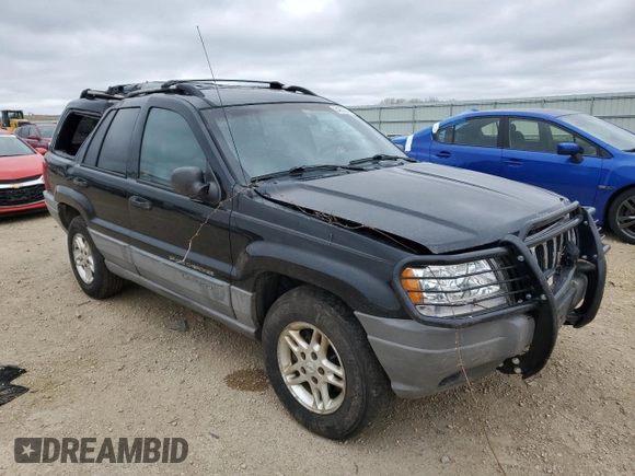 2000 Jeep Grand Cherokee Laredo with VIN 1J4GW48S2YC336733, listed as a Copart auction lot 54553315 with 284,402 mi miles and Non repairable. Bid and sale history available at DreamBid. Image 4.