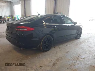 2017 Ford Fusion SE with VIN 3FA6P0H73HR328666, listed as a IAAI auction lot 42423632 with 217,923 mi miles and . Bid and sale history available at DreamBid. Image 4.