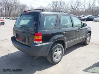 2003 Ford Escape XLS Popular with VIN 1FMYU02153KB46301, listed as a IAAI auction lot 41793418 with 188,184 mi miles. Bid and sale history available at carsss.com. Image 4.