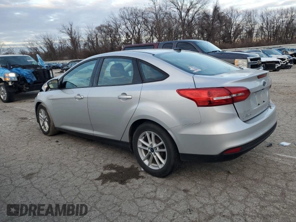 2015 Ford Focus SE with VIN 1FADP3F2XFL306322, listed as a Copart auction lot 41367765 with 58,901 mi miles and Salvage Title. Bid and sale history available at DreamBid. Image 2.