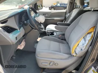 2015 Toyota Sienna LE AAS with VIN 5TDKK3DC9FS637144, listed as a Copart auction lot 59624495 with 151,681 mi miles and Salvage title. Bid and sale history available at DreamBid. Image 7.
