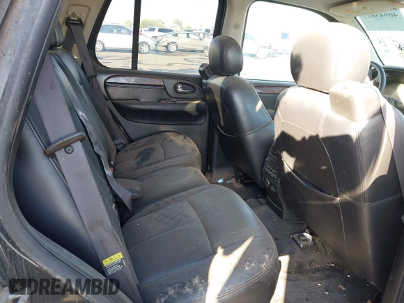 2005 GMC Envoy SLE with VIN 1GKDT13S752161375, listed as a IAAI auction lot 40945627 with 172,757 mi miles. Bid and sale history available at carsss.com. Image 8.