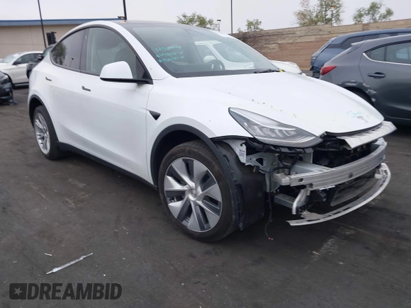 2023 Tesla Model Y Long Range z VIN 7SAYGDEE5PA063097, wystawiony jako IAAI lot #42171871 z przebiegiem Nie podano mil oraz . Historia ofert i sprzedaży dostępna na DreamBid. Obrazek 1.