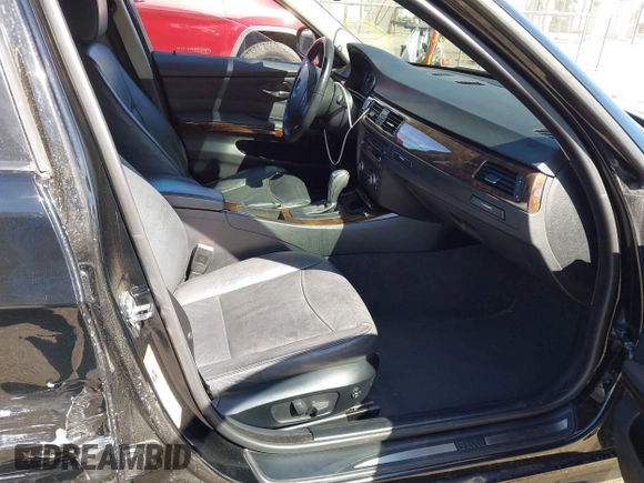 2009 BMW 3 Series 328i with VIN WBAPH57559NL77104, listed as a IAAI auction lot 41707276 with 146,170 mi miles and . Bid and sale history available at DreamBid. Image 5.
