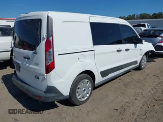 2015 Ford Transit Connect XLT with VIN NM0LS7F70F1224907, listed as a IAAI auction lot 41687421 with 226,518 mi miles and . Bid and sale history available at DreamBid. Image 4.
