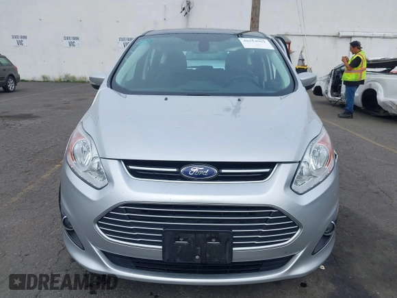 2014 Ford C-Max SEL z VIN 1FADP5BU7EL511677, wystawiony jako IAAI lot #40554962 z przebiegiem 63 031 mil mil oraz . Historia ofert i sprzedaży dostępna na DreamBid. Obrazek 11.