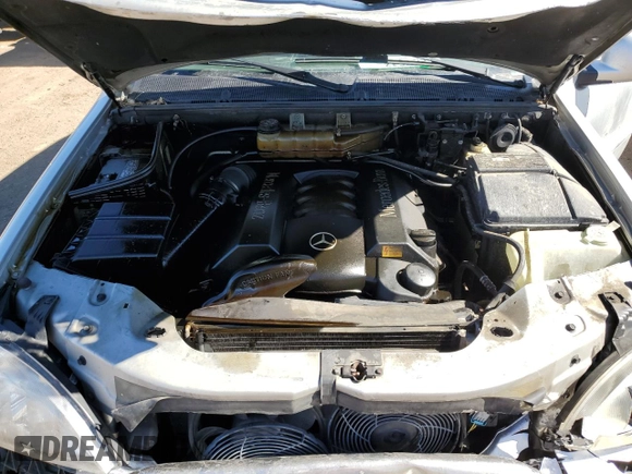 2000 Mercedes-Benz M 320/430/500 with VIN 4JGAB72E3YA172993, listed as a Copart auction lot 47051815 with 112,355 mi miles and Salvage title. Bid and sale history available at DreamBid. Image 13.