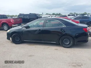 2014 Toyota Camry L with VIN 4T1BF1FK8EU468379, listed as a IAAI auction lot 42134387 with 101,603 mi miles and . Bid and sale history available at DreamBid. Image 14.