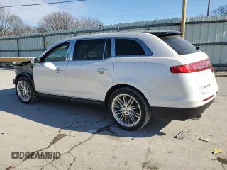2016 Lincoln MKT EcoBoost z VIN 2LMHJ5AT5GBL01314, wystawiony jako Copart lot #88693385 z przebiegiem 75 777 mil mil oraz Szkoda całkowita • Salvage title. Historia ofert i sprzedaży dostępna na DreamBid. Obrazek 2.
