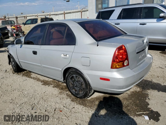 2004 Hyundai Accent GL with VIN KMHCG45C74U550647, listed as a Copart auction lot 74526474 with 115,838 mi miles and Salvage Title. Bid and sale history available at carsss.com. Image 2.