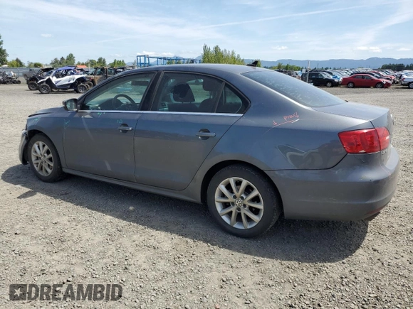 2013 Volkswagen Jetta SE with VIN 3VWDP7AJXDM281723, listed as a Copart auction lot 57235725 with 128,157 mi miles and Salvage title. Bid and sale history available at DreamBid. Image 2.