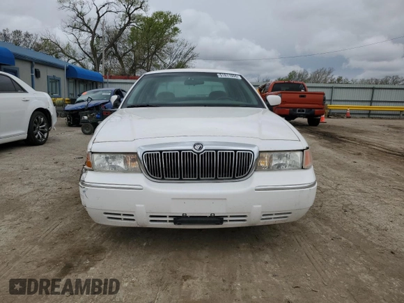1999 Mercury Grand Marquis GS z VIN 2MEFM74W0XX670924, wystawiony jako Copart lot #51811055 z przebiegiem 176 559 mil mil oraz Szkoda całkowita • Salvage title. Historia ofert i sprzedaży dostępna na DreamBid. Obrazek 5.