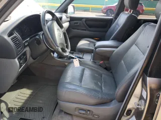 2002 Toyota Land Cruiser z VIN JTEHT05J522027452, wystawiony jako Copart lot #51141595 z przebiegiem 278 465 mil mil oraz Szkoda całkowita • Salvage title. Historia ofert i sprzedaży dostępna na DreamBid. Obrazek 7.