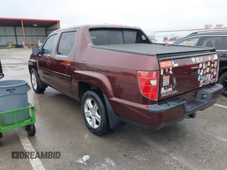 2009 Honda Ridgeline RTL with VIN 5FPYK16529B100032, listed as a IAAI auction lot 41206781 with 130,694 mi miles and . Bid and sale history available at DreamBid. Image 3.