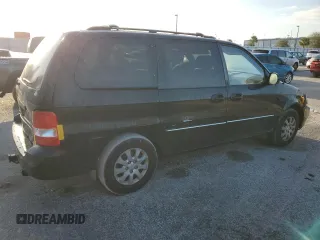 2005 Kia Sedona LX with VIN KNDUP131056640057, listed as a Copart auction lot 72153844 with 192,136 mi miles and Salvage Title. Bid and sale history available at carsss.com. Image 3.