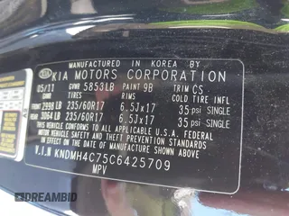2012 Kia Sedona EX with VIN KNDMH4C75C6425709, listed as a IAAI auction lot 41879455 with 201,086 mi miles. Bid and sale history available at carsss.com. Image 9.