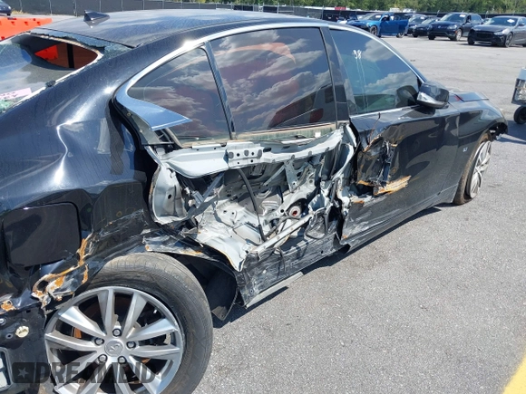 2015 Infiniti Q50 Premium with VIN JN1BV7AR0FM407577, listed as a IAAI auction lot 40191466 with 94,239 mi miles. Bid and sale history available at carsss.com. Image 12.