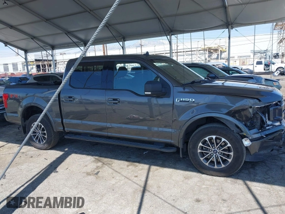2019 Ford F-150 XL with VIN 1FTEW1E41KKC35889, listed as a IAAI auction lot 41828622 with Not Provided miles and . Bid and sale history available at DreamBid. Image 13.