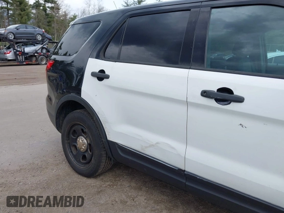 2013 Ford Utility Police Interceptor with VIN 1FM5K8AR3DGC20995, listed as a IAAI auction lot 42041125 with 199,419 mi miles. Bid and sale history available at carsss.com. Image 12.