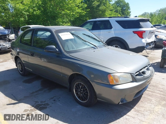 2001 Hyundai Accent GLS z VIN KMHCG35C01U136132, wystawiony jako IAAI lot #42293830 z przebiegiem 111 906 mil mil oraz . Historia ofert i sprzedaży dostępna na DreamBid. Obrazek 1.