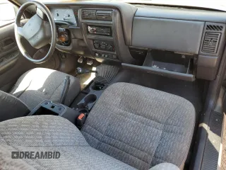 2000 Jeep Cherokee SE with VIN 1J4FT27P6YL127419, listed as a Copart auction lot 74211284 with 199,078 mi miles and Clean title. Bid and sale history available at DreamBid. Image 8.