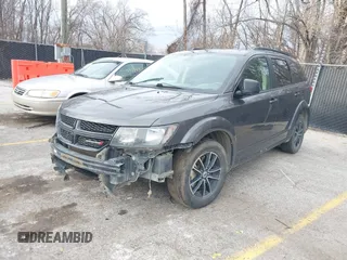 2019 Dodge Journey SE with VIN 3C4PDCBG2KT738516, listed as a IAAI auction lot 41112993 with 201,908 mi miles and . Bid and sale history available at DreamBid. Image 2.