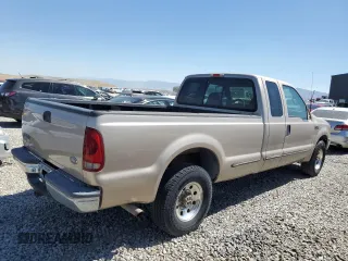 1999 Ford F-250 XL z VIN 1FTNX20S3XEA68692, wystawiony jako Copart lot #64331775 z przebiegiem 106 939 mil mil oraz Czysty tytuł • Clean title. Historia ofert i sprzedaży dostępna na DreamBid. Obrazek 3.
