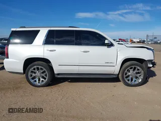 2020 GMC Yukon Denali with VIN 1GKS2CKJ3LR260455, listed as a IAAI auction lot 41690495 with 92,498 mi miles. Bid and sale history available at carsss.com. Image 13.