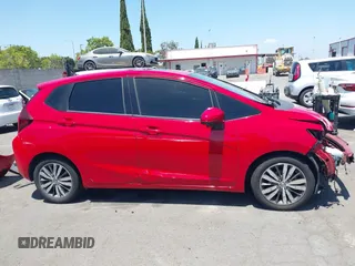 2015 Honda Fit EX-L z VIN 3HGGK5H84FM742893, wystawiony jako IAAI lot #42272487 z przebiegiem 84 942 mil mil oraz . Historia ofert i sprzedaży dostępna na DreamBid. Obrazek 14.
