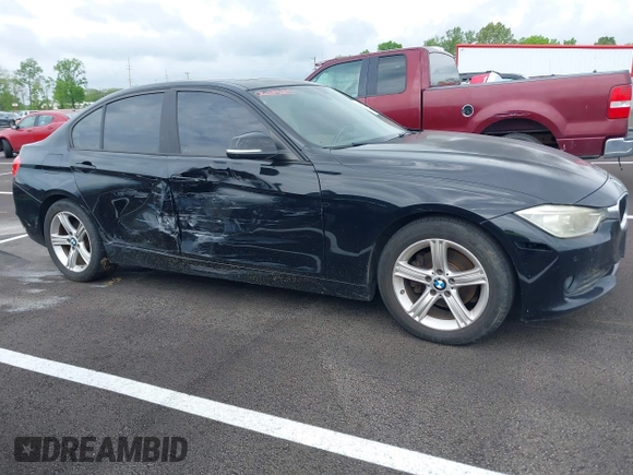 2015 BMW 3 Series 320i with VIN WBA3B1G57FNT05826, listed as a IAAI auction lot 42103193 with 128,800 mi miles. Bid and sale history available at carsss.com. Image 12.