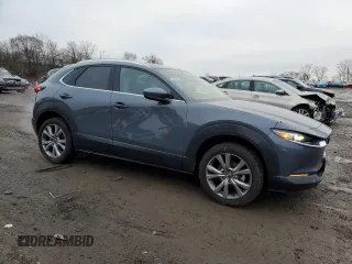 2020 Mazda CX-30 Premium with VIN 3MVDMBEM4LM136726, listed as a Copart auction lot 43734155 with 71,318 mi miles and Salvage title. Bid and sale history available at DreamBid. Image 4.
