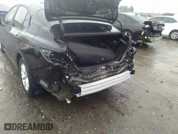 2025 Toyota Camry LE with VIN 4T1DAACK5SU060431, listed as a IAAI auction lot 41552223 with 2,490 mi miles and . Bid and sale history available at DreamBid. Image 6.