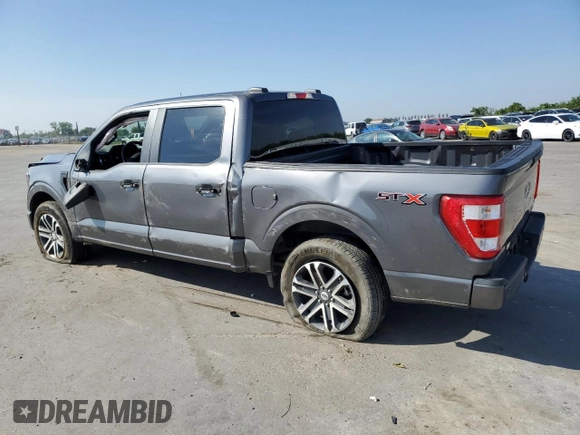 2023 Ford F-150 XL with VIN 1FTEW1CP4PKD21685, listed as a Copart auction lot 54992615 with 27,252 mi miles and Salvage title. Bid and sale history available at DreamBid. Image 2.