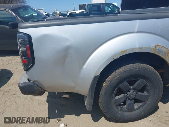 2011 Nissan Frontier Pro-4X with VIN 1N6AD0EVXBC407089, listed as a IAAI auction lot 42113537 with 124,853 mi miles and . Bid and sale history available at DreamBid. Image 6.