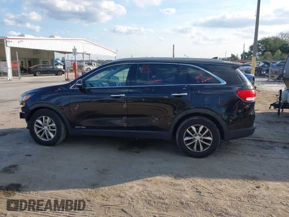 2016 Kia Sorento LX with VIN 5XYPGDA56GG029499, listed as a IAAI auction lot 41512850 with 179,971 mi miles. Bid and sale history available at carsss.com. Image 15.